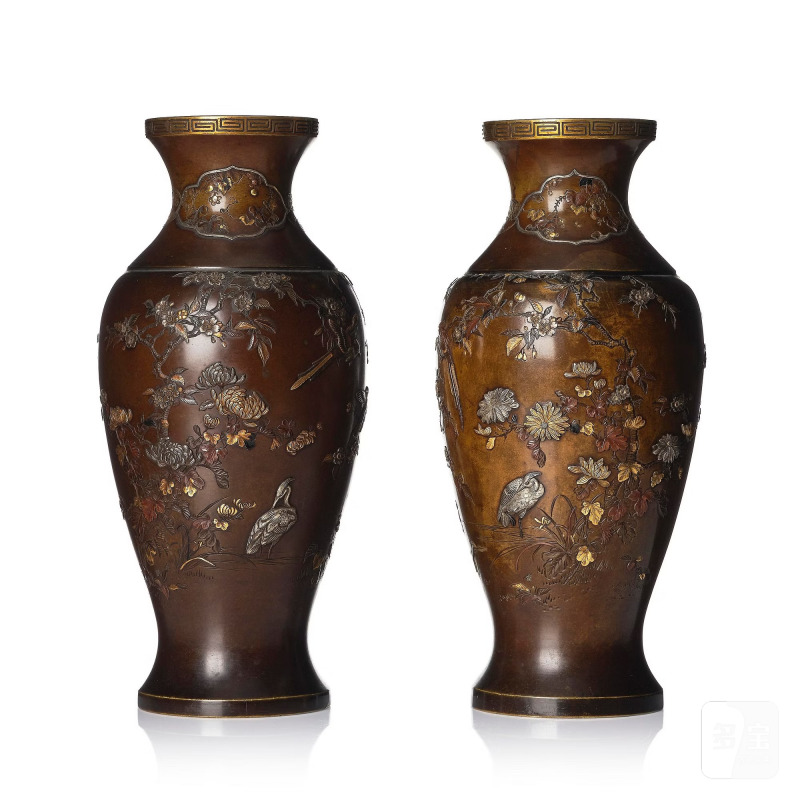 An impressive pair of Japanese inlayed bronze vases,